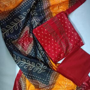 Vibrant Bandhani patterned fabric with intricate designs in a flat lay style.